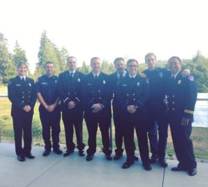 From left to right: Newly-hired Firefighter Janelle Randles, Intern Firefighter Scott Bothe, Lieutenant Alex Hickey, Firefighter/Paramedic Craig Barnard, newly-promoted Assistant Chief Sean Moran, newly-hired Firefighter Kaleb Murray, Intern Firefighter Tyler Horner and newly-promoted Battalion Chief Ardyl Abrigo